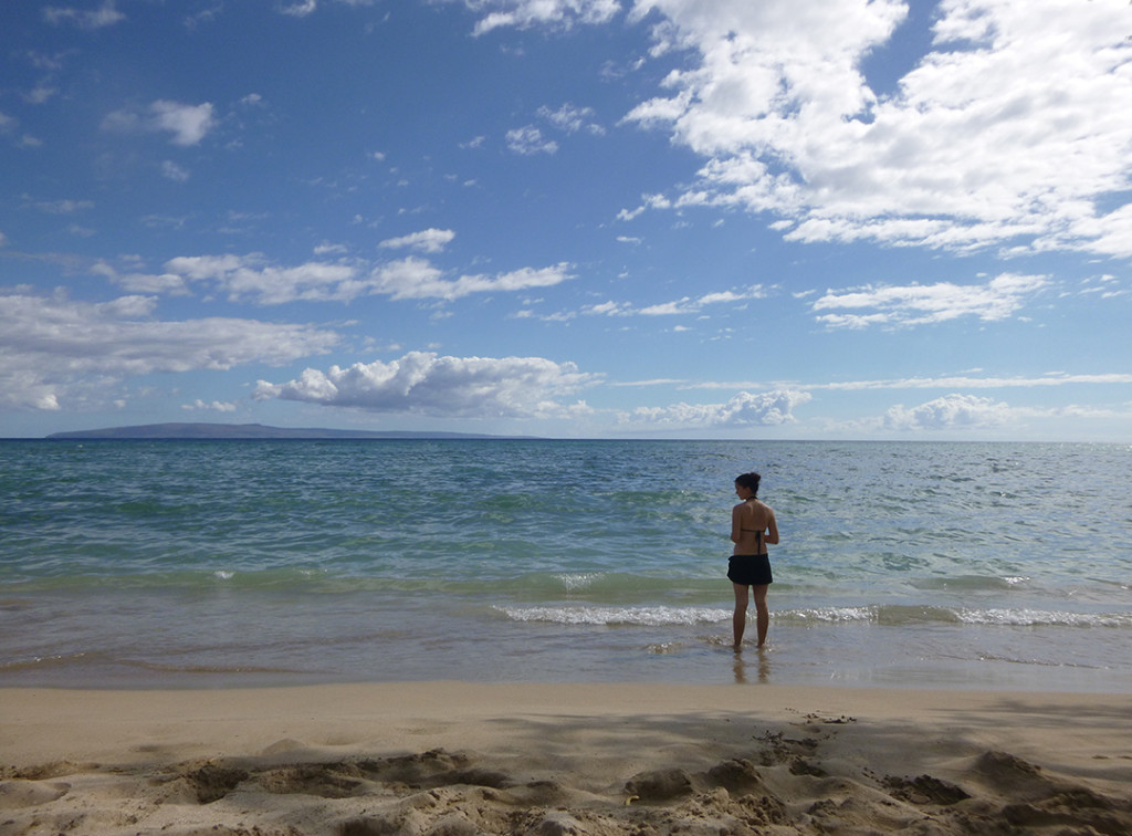 Ava stands by beach