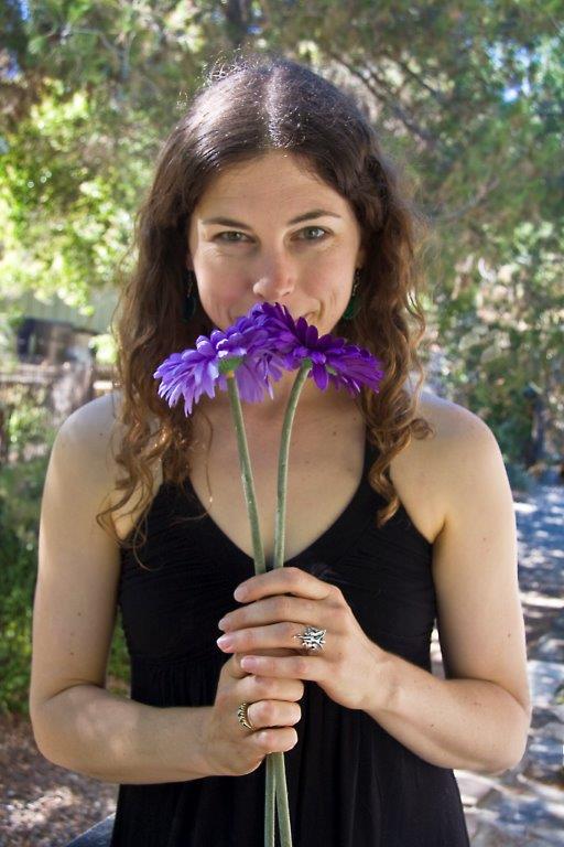 Naomi Smelling the flowers