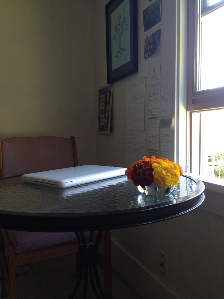 Bistro table desk with marigolds